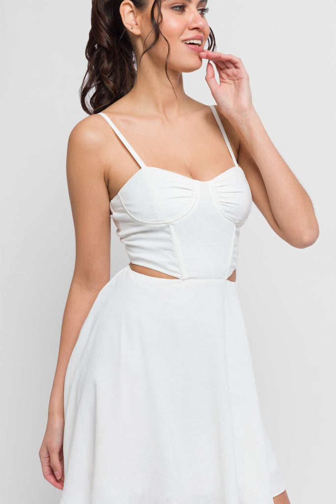Why mini dress in white with hip cutouts. Chic & daring - Jadedroselondon