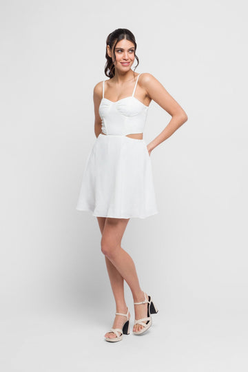 Why mini dress in white with hip cutouts. Chic & daring - Jadedroselondon